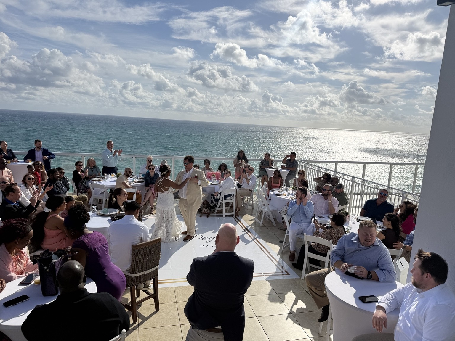 Actual penthouse wedding reception overlooking the ocean