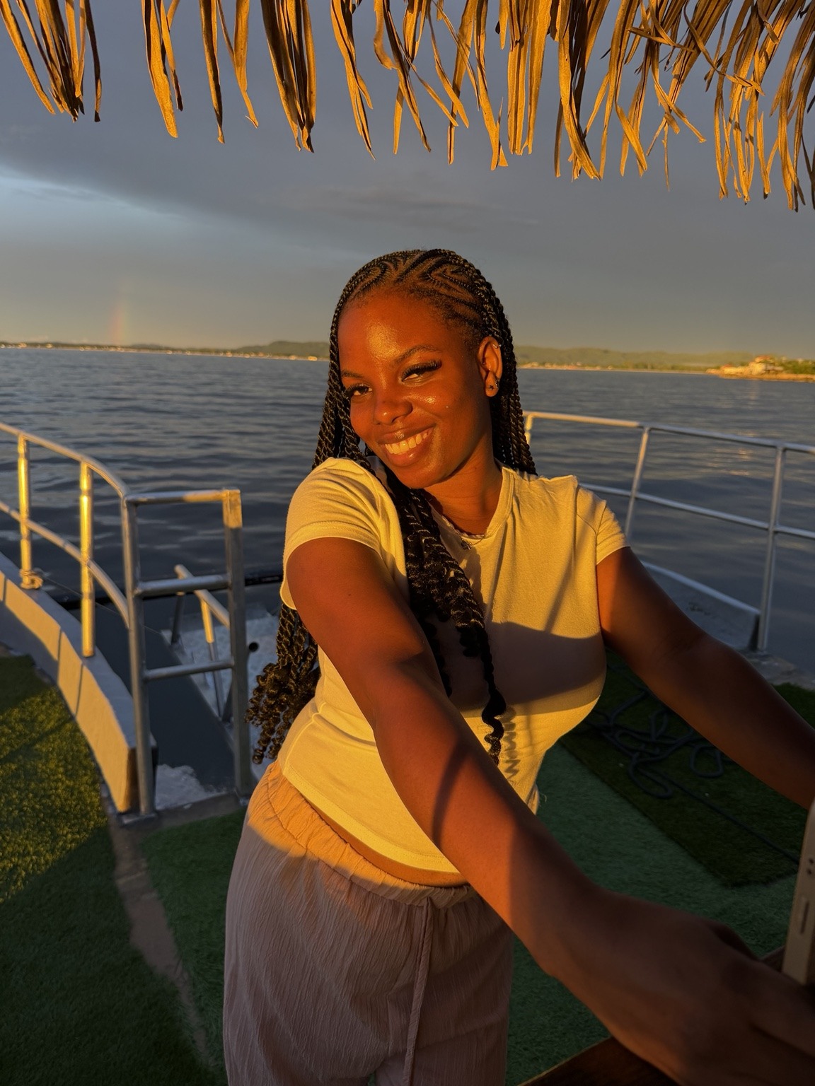 The smile behind the messages. Shanon brings her warmth from Jamaica to every detail she helps arrange.