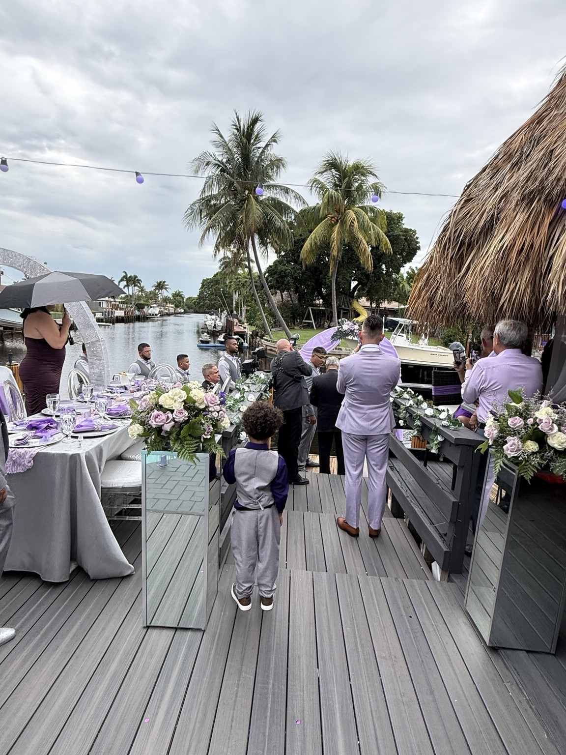 A wedding moment along the waterfront aisle